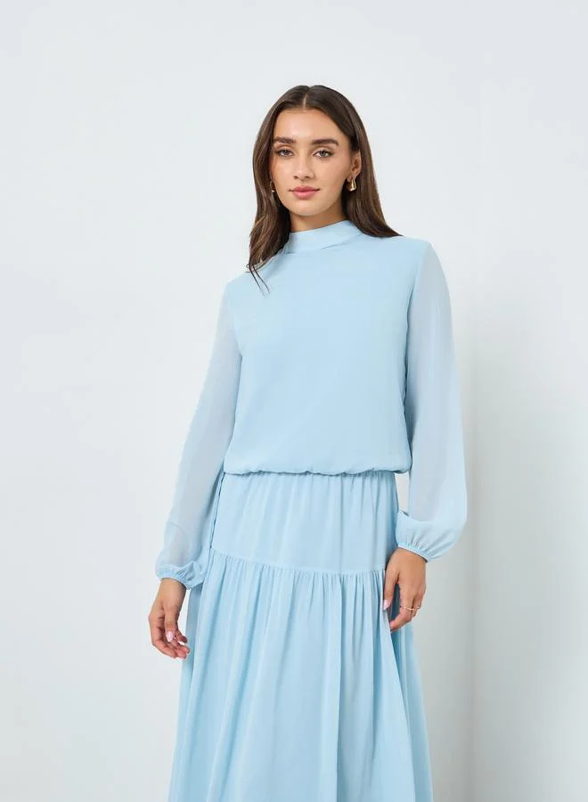 ستايلي فستان طويل بطبقات وأكمام بالون